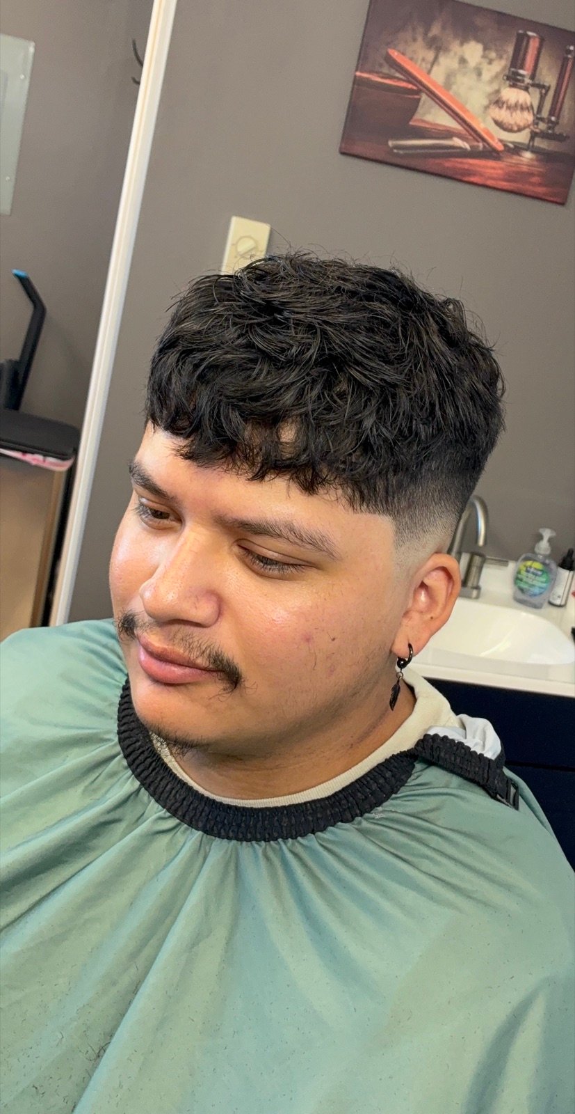 Curly textured top with fade