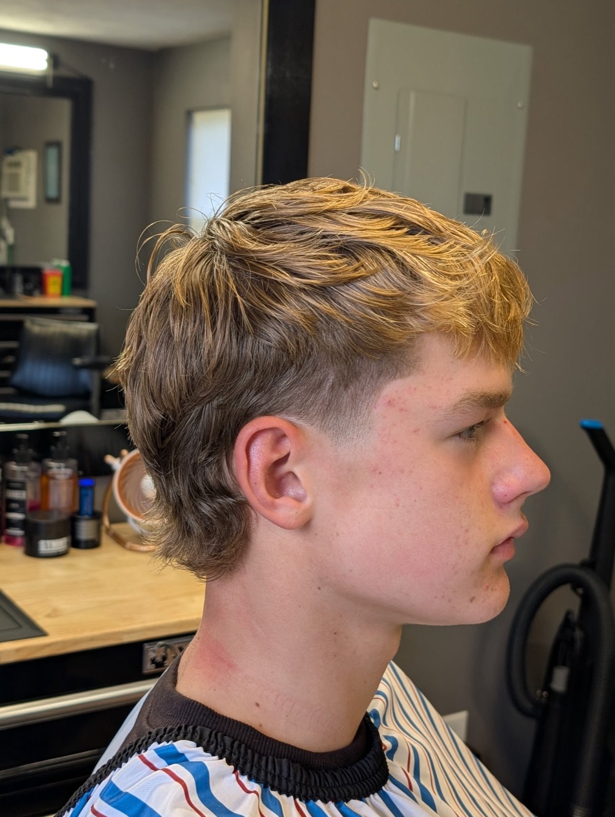 Blonde textured mullet fade